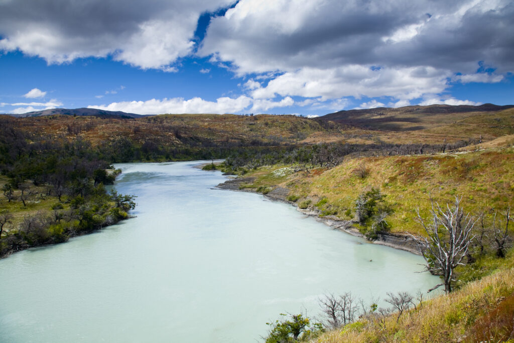 Chile, Southern Patagonia, Torres Del Paine National Park. The glacial coloured waters of the Rio Paine on the Circuit track.
