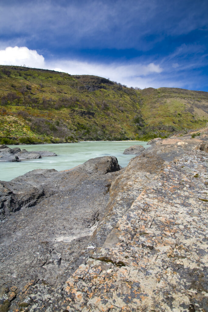RF - Chile, Southern Patagonia, Torres Del Paine National Park. The glacial coloured waters of the Rio Paine on the Circuit track.