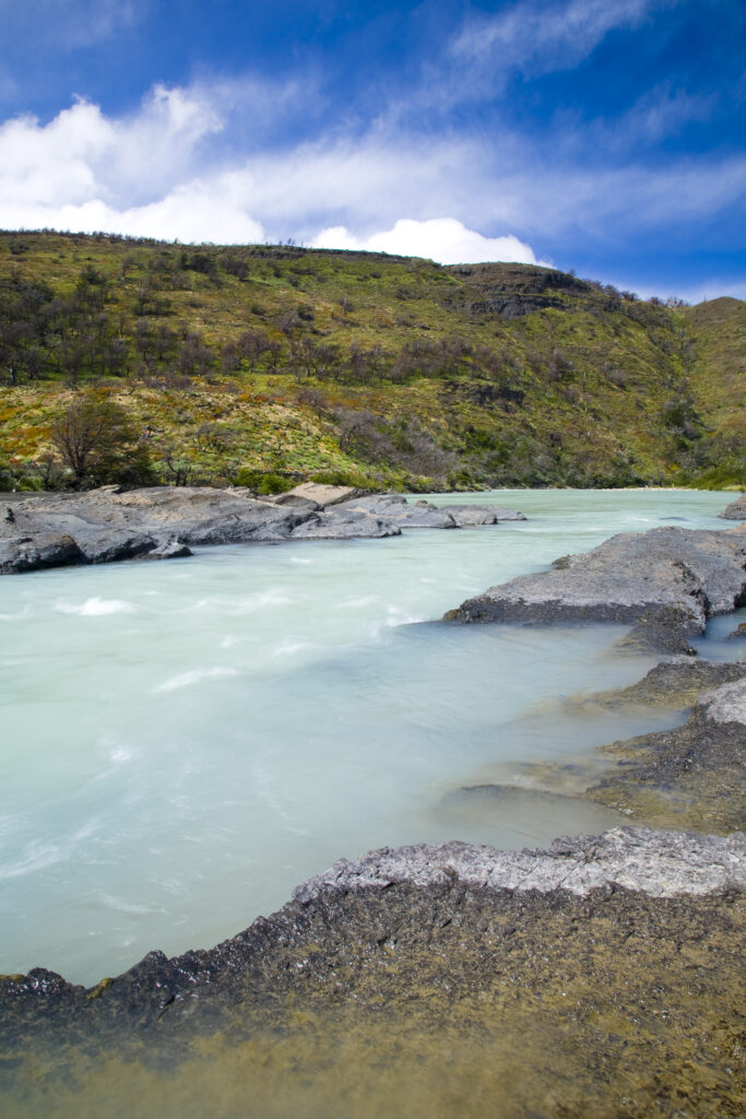 Chile, Southern Patagonia, Torres Del Paine National Park. The glacial coloured waters of the Rio Paine on the Circuit track.