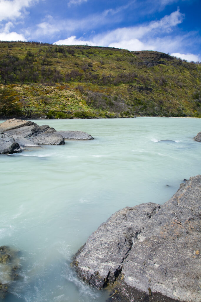 Chile, Southern Patagonia, Torres Del Paine National Park. The glacial coloured waters of the Rio Paine on the Circuit track.
