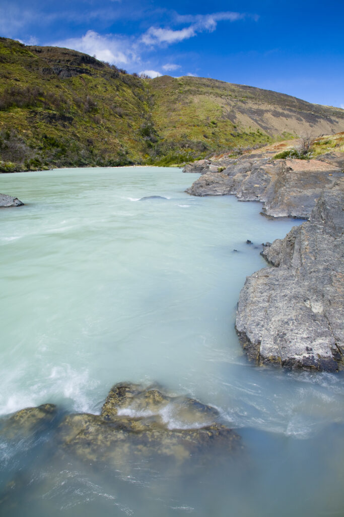 Chile, Southern Patagonia, Torres Del Paine National Park. The glacial coloured waters of the Rio Paine on the Circuit track.