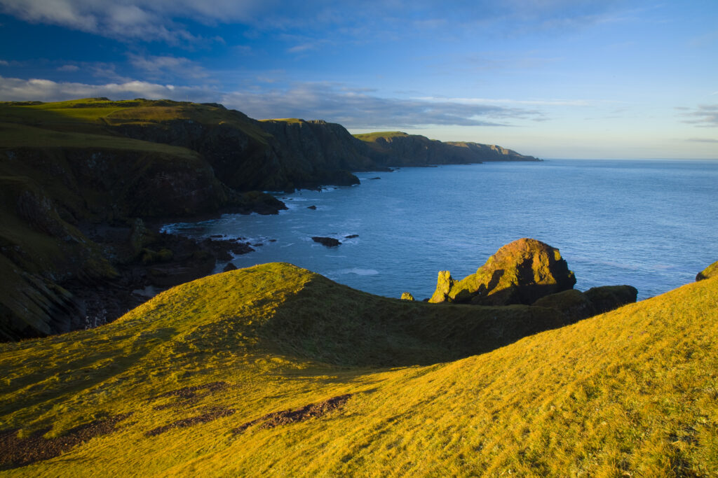 Scotland, Scottish Borders, St Abbs Nature Reserve. Undulating hills and cliffs along the east coast, looking north from the St Abbs National Nature Reserve.