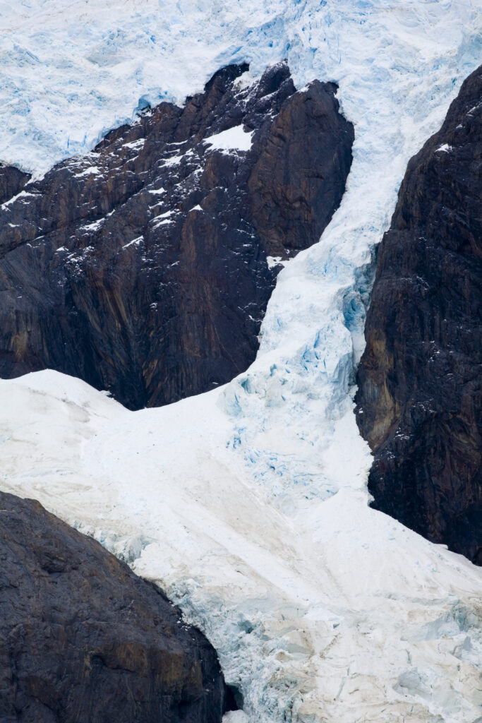 RF - Chile, Southern Patagonia, Torres Del Paine National Park. The perros glaciar running down into a lake passed on the circuit track.