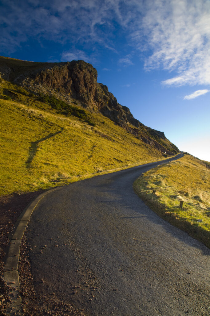 Scotland, Scottish Borders, St Abbs Nature Reserve. Single track road heading towards the St Abbs lighthouse, through the St Abbs National Nature Reserve.
