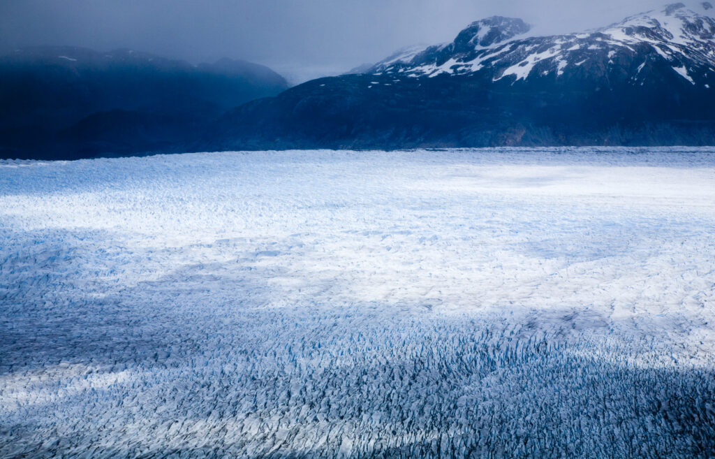 Chile, Southern Patagonia, Torres Del Paine National Park. A clearing storm reveals the Patagonian Ice Field and the Grey Glacier.