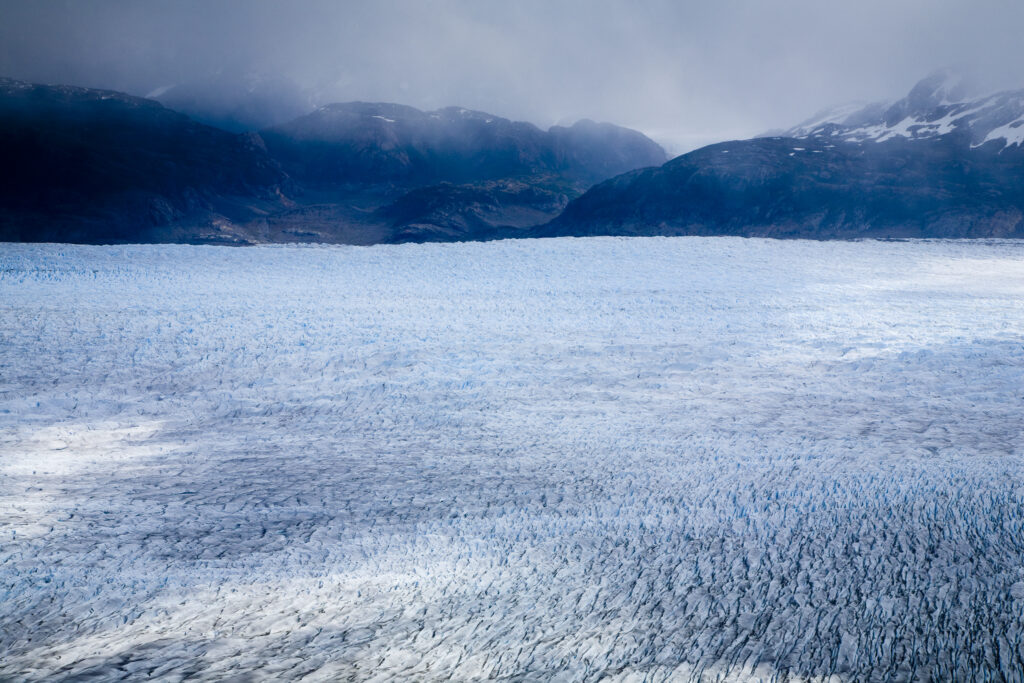 Chile, Southern Patagonia, Torres Del Paine National Park. A clearing storm reveals the Patagonian Ice Field and the Grey Glacier.