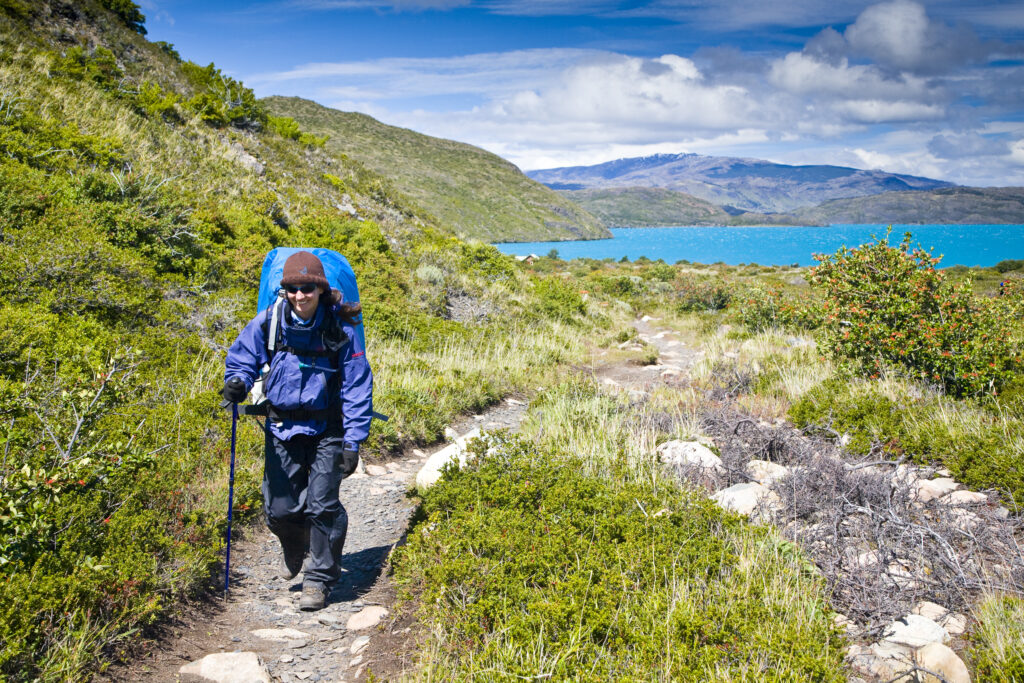 RF - Chile, Southern Patagonia, Torres Del Paine National Park. Hiker walking the circuit / W track heading towards the Pehoe refuge.