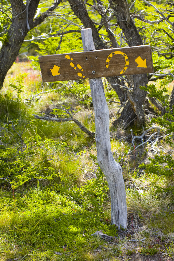 Argentina, Patagonia, Los Glaciares National Park. Sign indicating hiking and horse route.