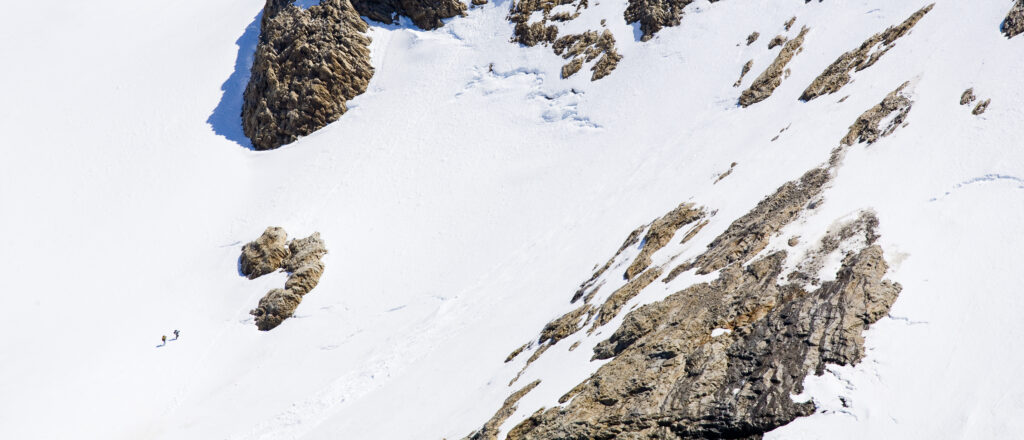 Argentina, Patagonia, Los Glaciares National Park. Two hikers ascend the impressive landscape of the foothills of Fitz Roy.