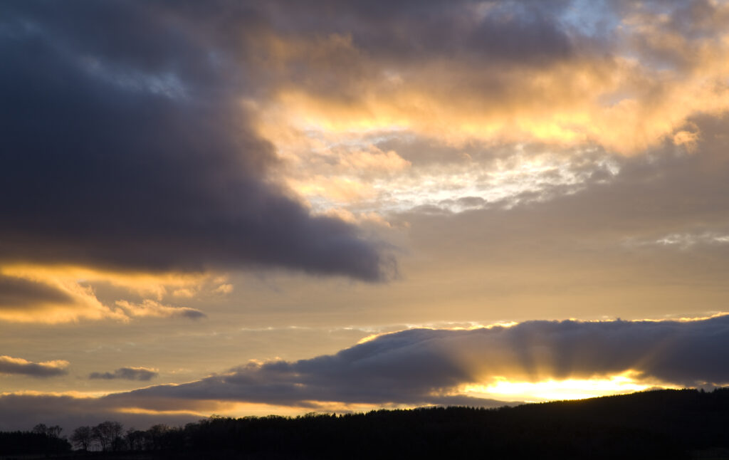 Scotland, Scottish Borders, Kyles Hill. Sunset above Kyles Hill, in the area known as the Merse.