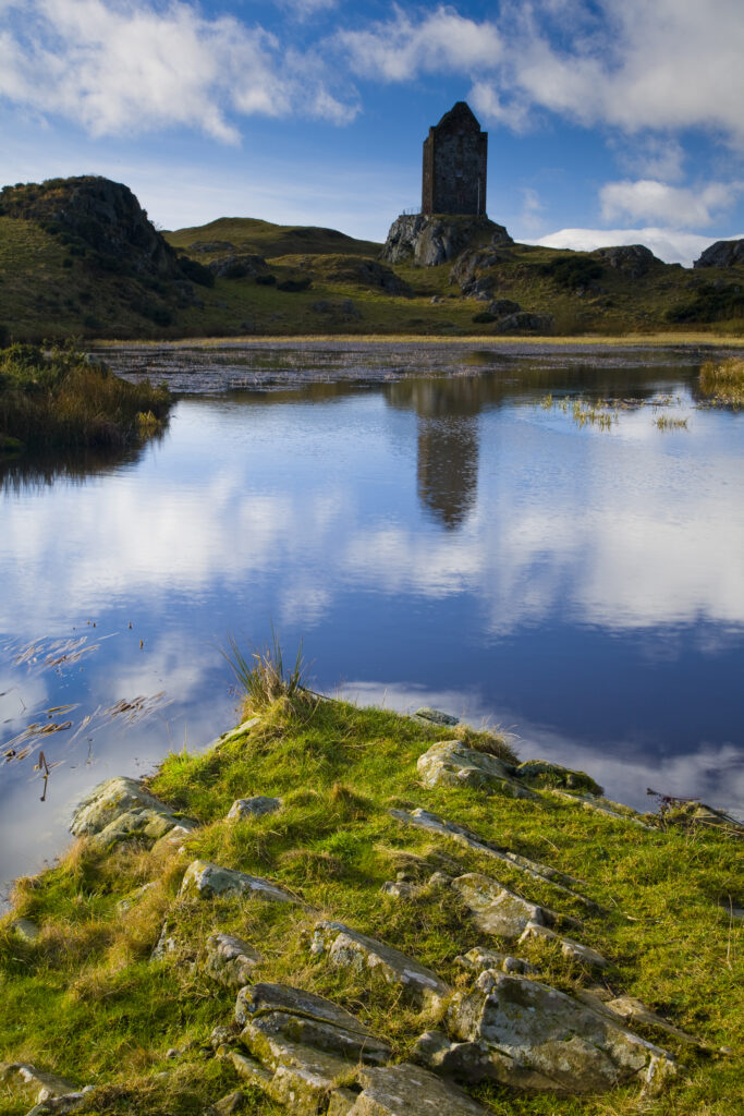 Scotland, Scottish Borders, Smailholm Tower. The well preserved remains of Smailholm Tower. The location of the rectangular tower on a hilly outcrop ensures that it dominates the surrounding landscape for miles.