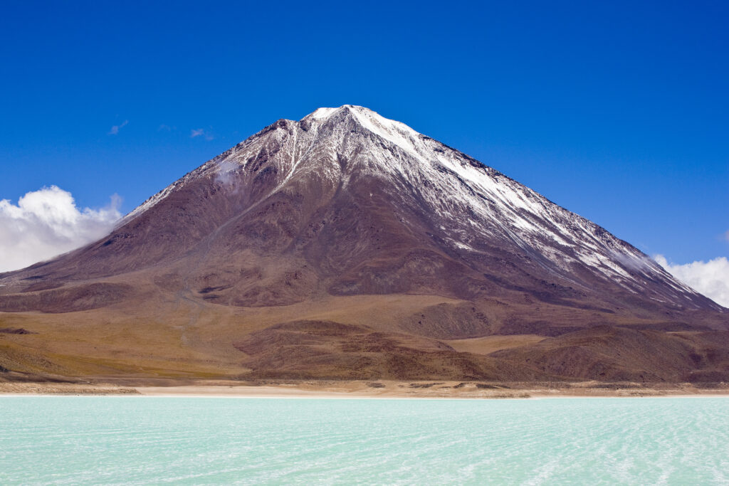 Bolivia, Southern Altiplano, Laguna Verde. Laguna Verde and Volcan Licancabur.