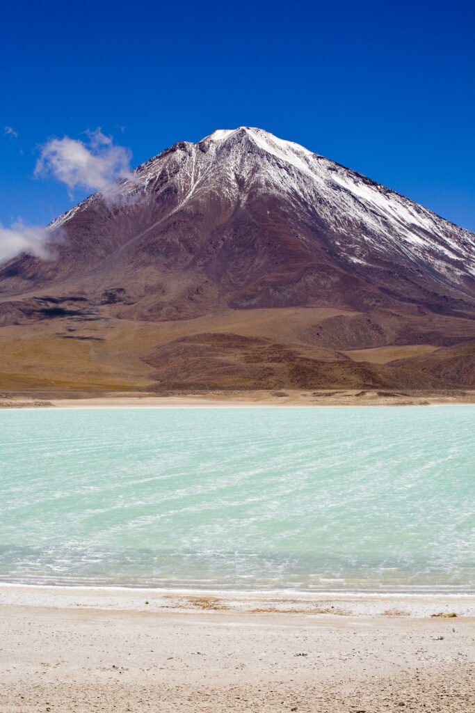 Bolivia, Southern Altiplano, Laguna Verde. Laguna Verde and Volcan Licancabur.