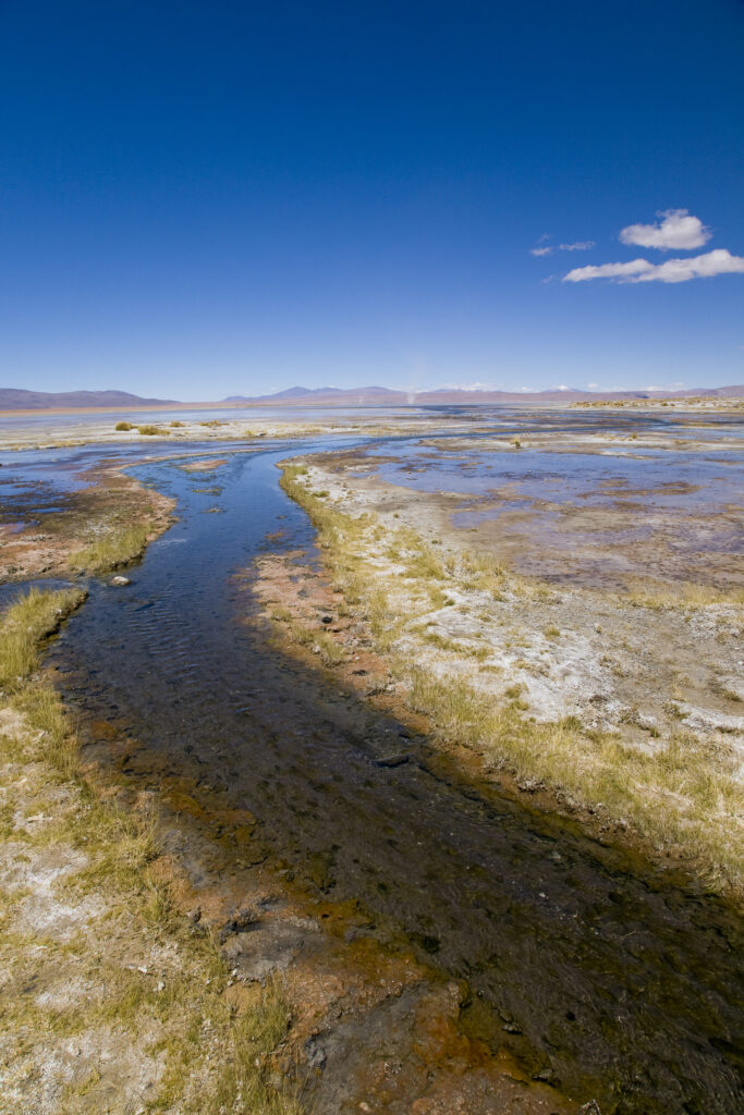 Bolivia, Southern Altiplano, Termas de Polques. Stream coloured by minerals near the Termas de Polques otherwise known as the Hot Pools.
