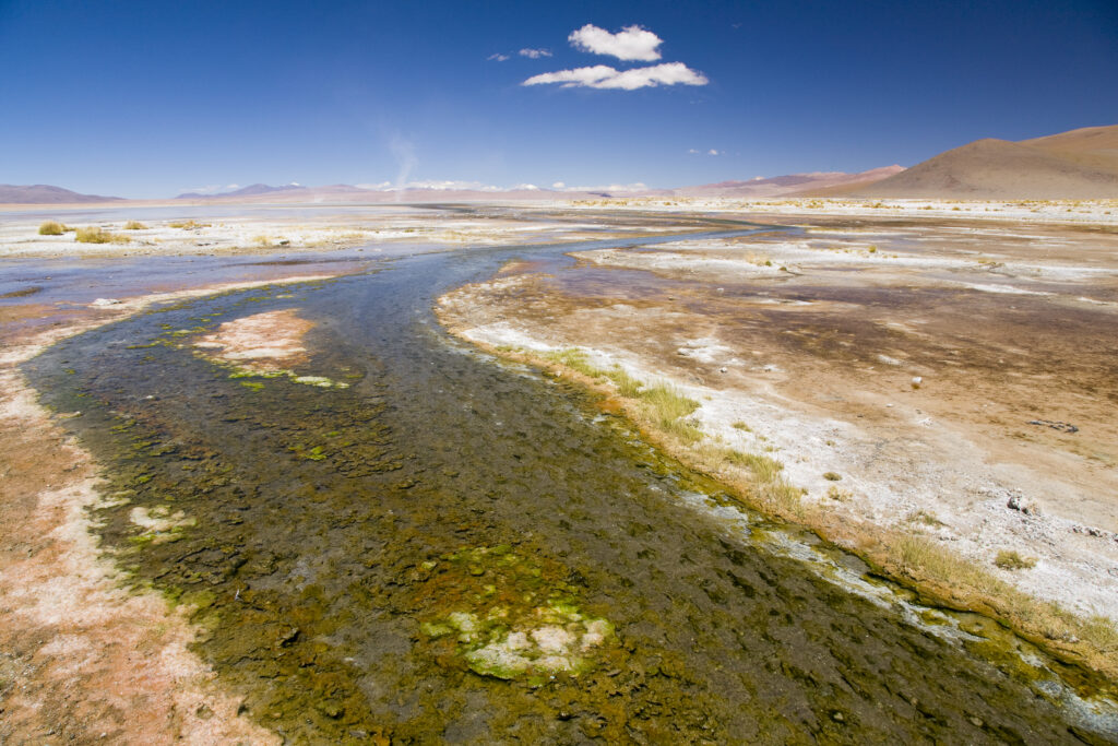 Bolivia, Southern Altiplano, Termas de Polques. Stream coloured by minerals near the Termas de Polques otherwise known as the Hot Pools.