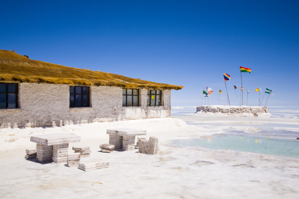 Bolivia, Southern Altiplano, Salar de Uyuni. Building and seating constructed of salt, located on the Salar de Uyuni salt flat.