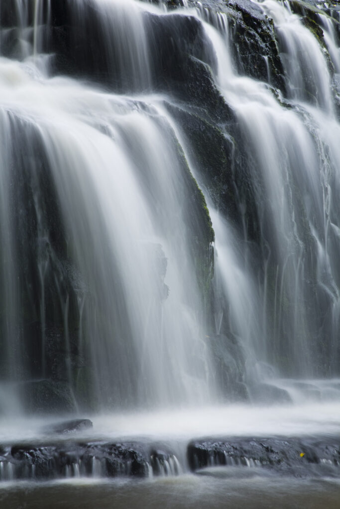 New Zealand, Southland, The Catlins. Abstract view of the Purakaunui Falls in the Catlins Forest Park.