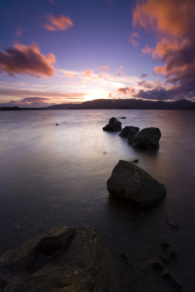 Scotland, Stirling, Loch Lomond and the Trossachs National Park. Sunset over Loch Lomond viewed from the bay of Milarrochy.
