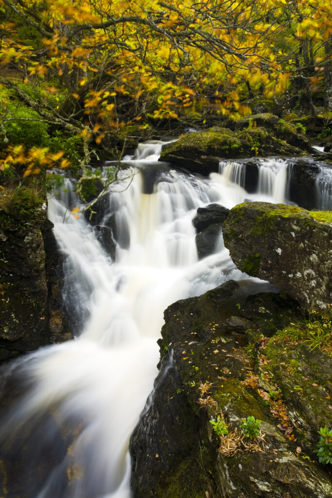 Scotland, Stirling, Loch Lomond and the Trossachs National Park. Arklet Falls and Sniad Burn near Inversnaid during Autumn.