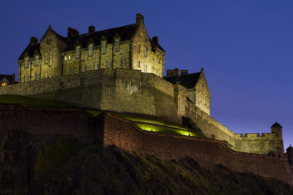 Scotland, Edinburgh, Edinburgh Castle. Edinburgh Castle illuminated at night.