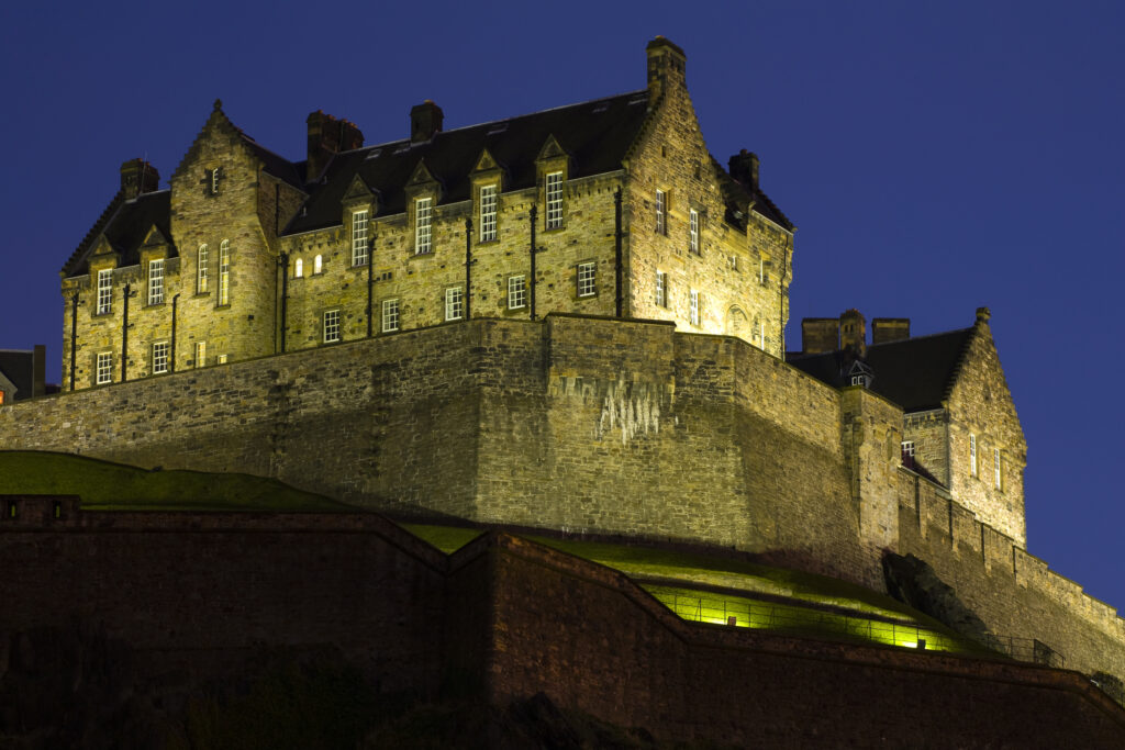 Scotland, Edinburgh, Edinburgh Castle. Edinburgh Castle illuminated at night.