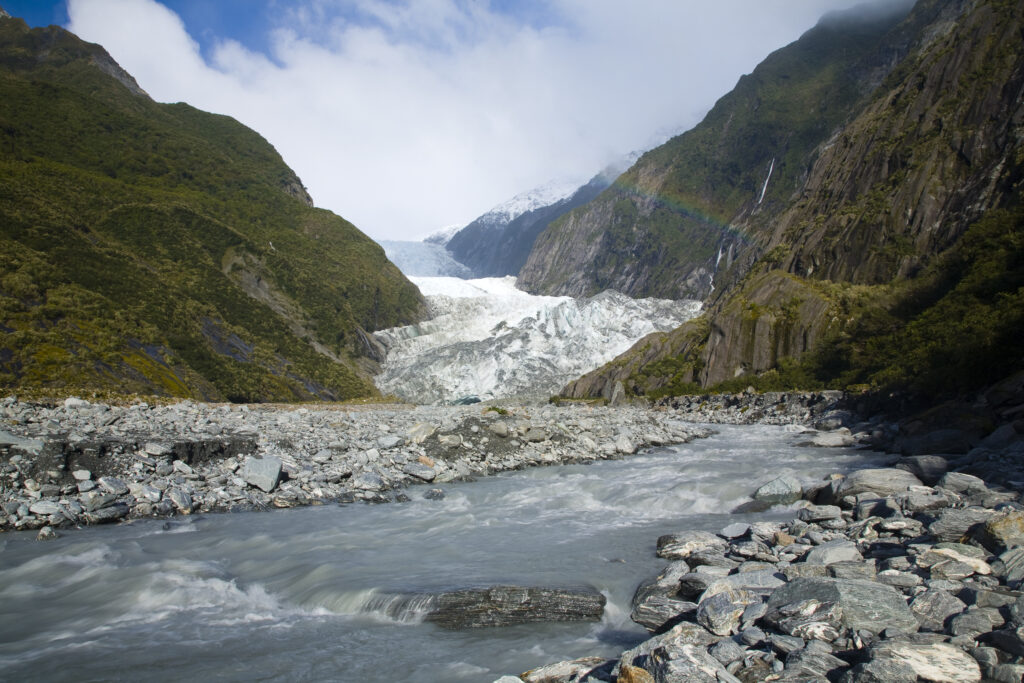 NEW ZEALAND, Westland, Westland National Park. Glacial valley and river downstream of the Franz Josef Glacier.