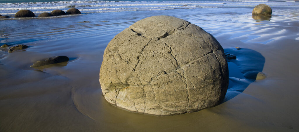 New Zealand, Otago, Moeraki Boulders. The famous spherical Moeraki boulders on the North Otago coast.