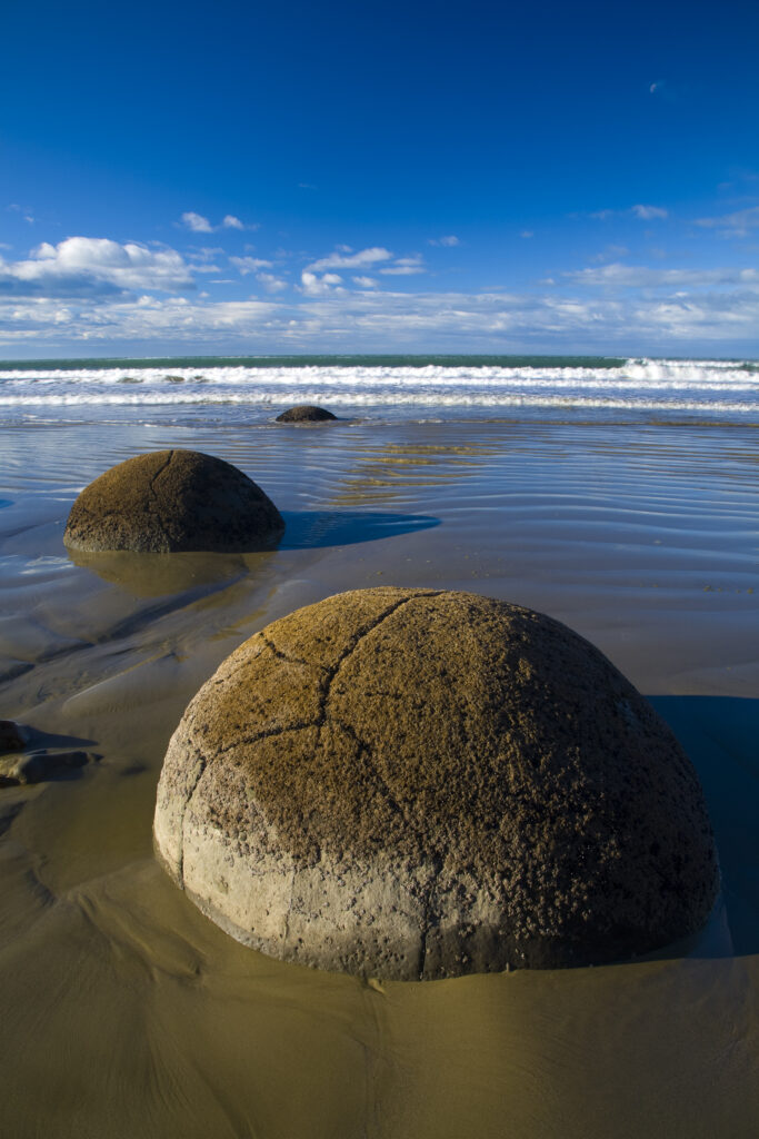New Zealand, Otago, Moeraki Boulders. The famous spherical Moeraki boulders on the North Otago coast.