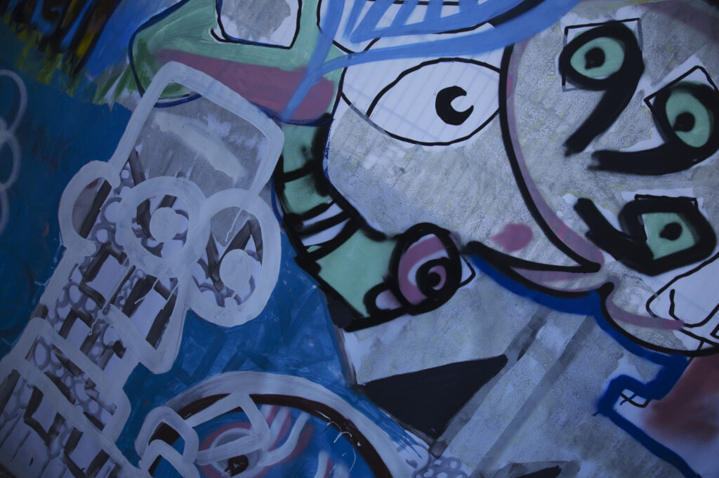 Netherlands, North Holland, Amsterdam. Graffiti sprayed / painted on a temporary fence panel in Amsterdam City.