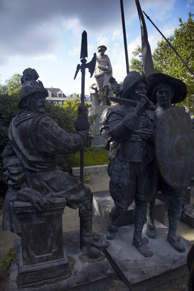 Netherlands, North Holland, Amsterdam. Rembrandt and the Night Watch statues on the Rembrandtplein in Amsterdam City.