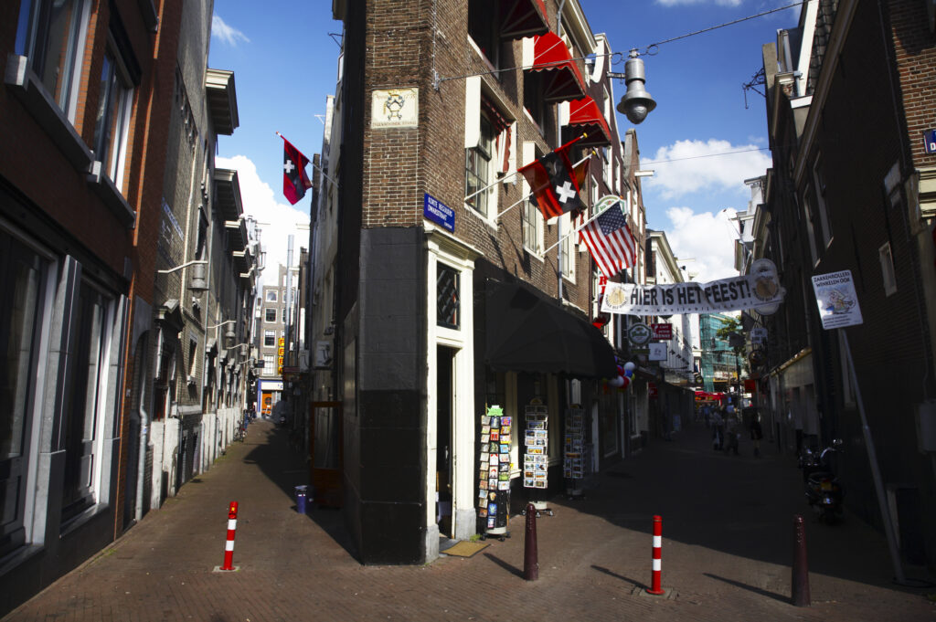 Netherlands, North Holland, Amsterdam. Unusual shaped building in a pedestrian street near the Rembrandplein in Amsterdam City.