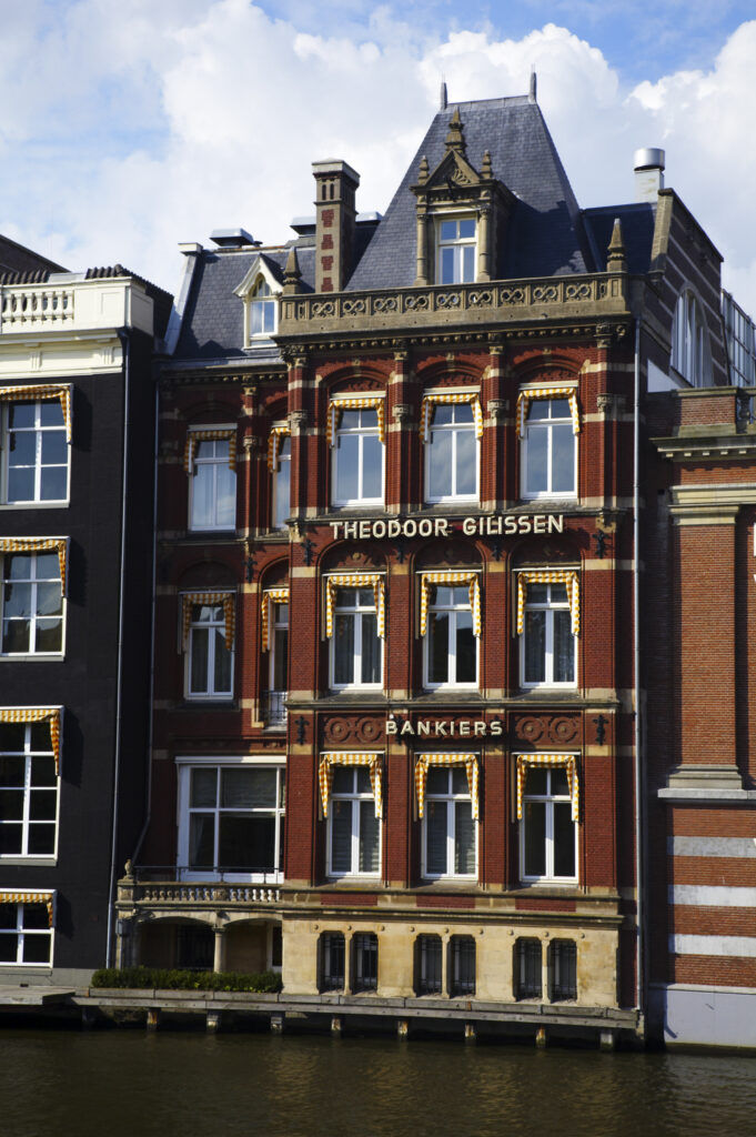 Netherlands, North Holland, Amsterdam. The Theodoor Gilissen Bankers Building, located on the banks of the River Amstel in Amsterdam City.