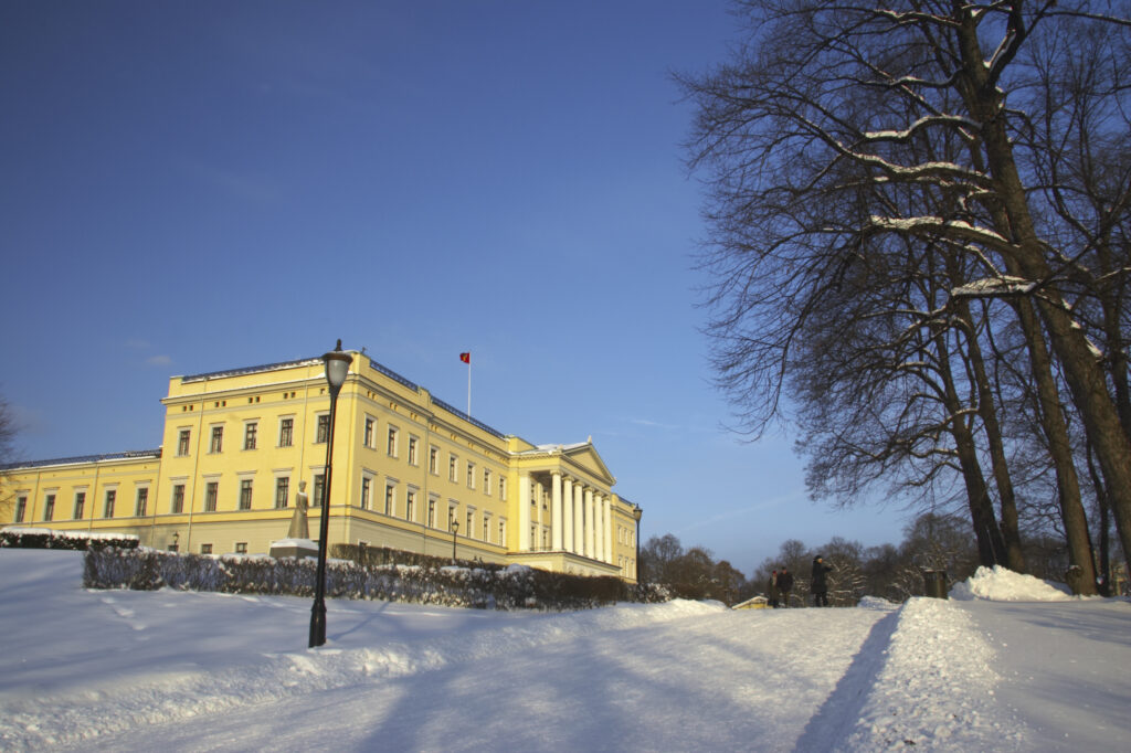 Norway, Oslo, Oslo City. The Royal Palace and surrounding park and gardens, after a heavy winter snow fall.