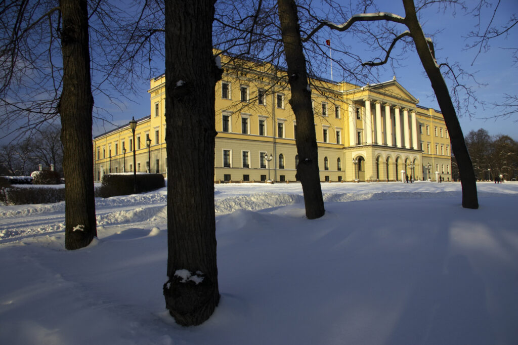 Norway, Oslo, Oslo City. The Royal Palace and surrounding park and gardens, after a heavy winter snow fall.
