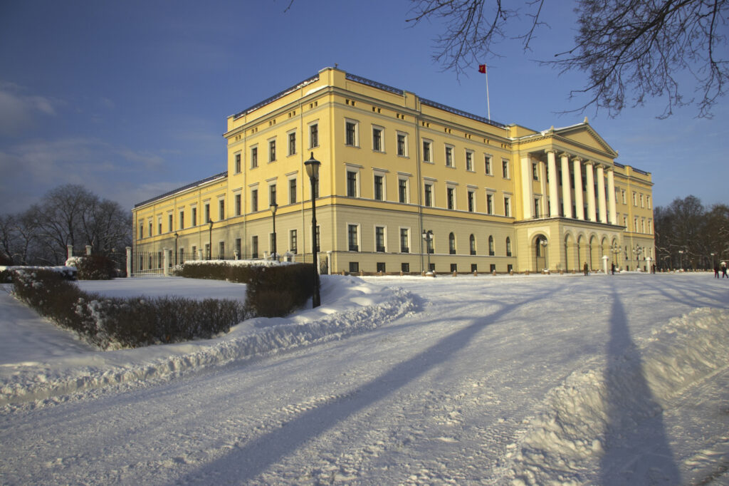 Norway, Oslo, Oslo City. The Royal Palace and surrounding park and gardens, after a heavy winter snow fall.