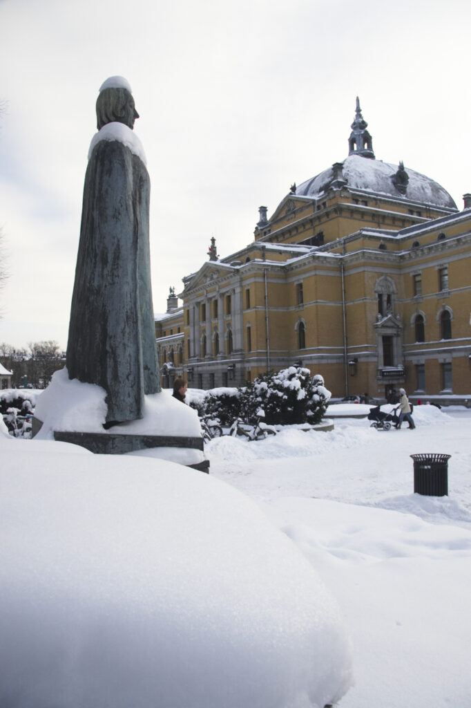 Norway, Oslo, Oslo City. The National Theatre and surrounding gardens and statues, transformed by a winter snowfall.