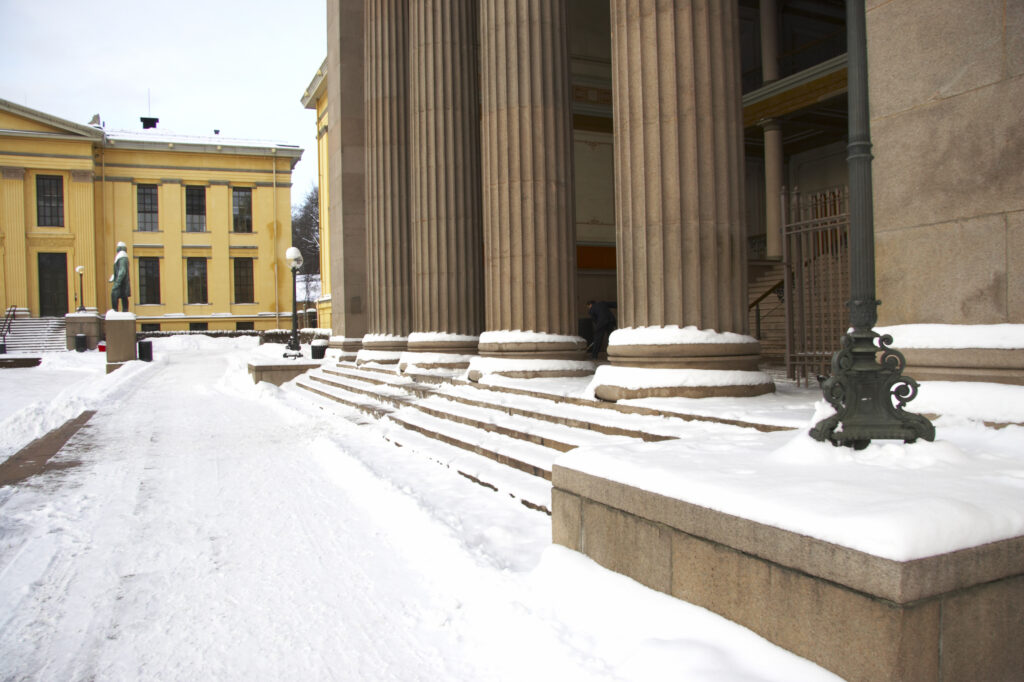 Norway, Oslo, Oslo City. The impressive architecture of the University Of Oslo Buildings, surrounded by snow.