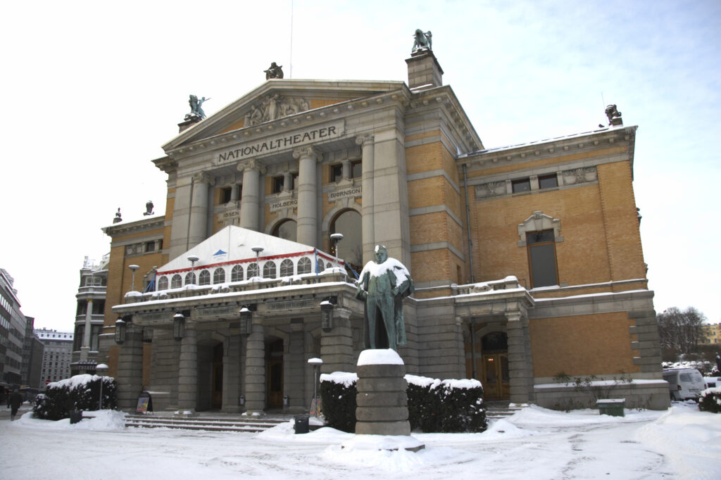 Norway, Oslo, Oslo City. The National Theatre, surrounded by snow.