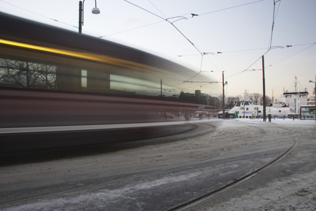 Norway, Oslo, Oslo City. Metro train and tram lines next to the Nobel Peace Center near Aker Quay, in Oslo city.