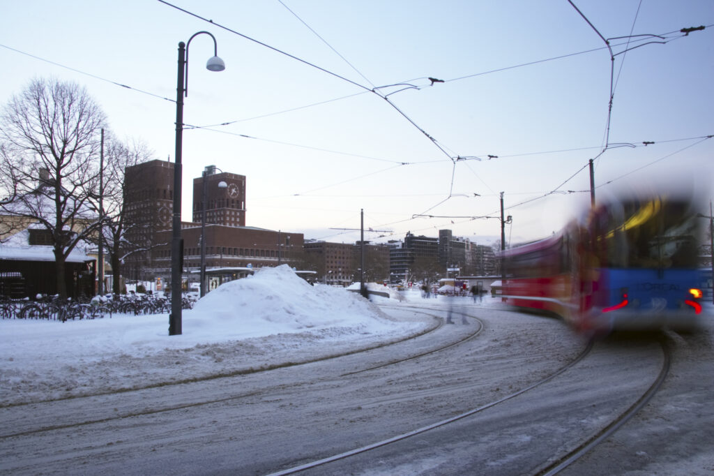 Norway, Oslo, Oslo City. Metro train and tram lines next to the Nobel Peace Center near Aker Quay, in Oslo city.