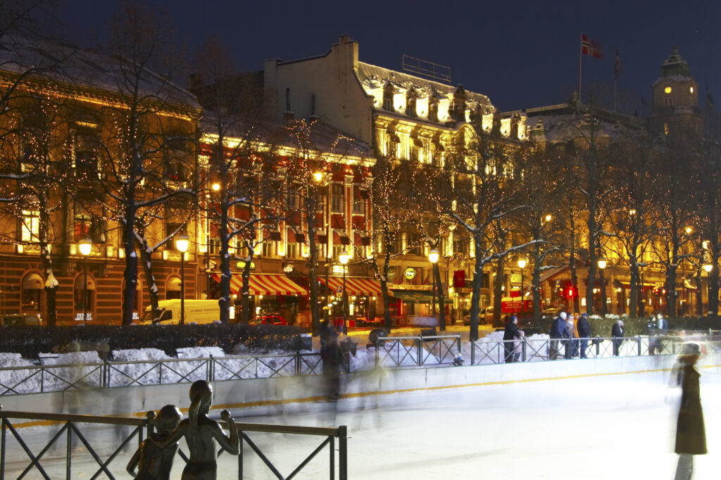 Norway, Oslo, Oslo City. Ice skating rink outside the National Theatre in Oslo City / Oslo region.