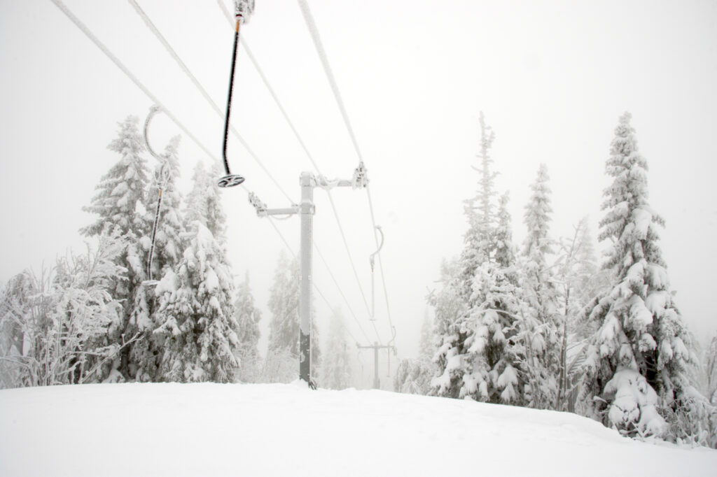 Norway, Oslo, Holmenkollen. Ski tow bar covered in ice on the slopes of the Tryvann Skifield, in the Holmenkollen area.
