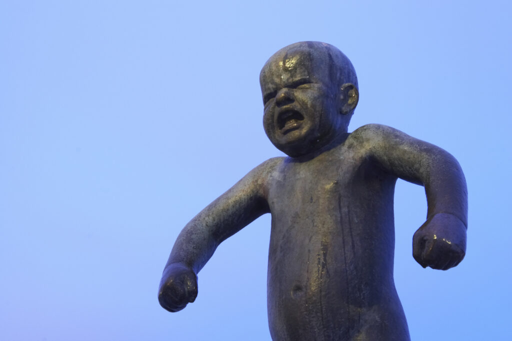 Norway, Oslo, Oslo City. One of the famous statues by Gustav Vigeland in the Vigeland Park in Oslo City.