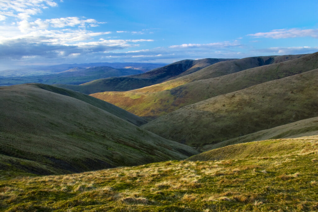 England, Cumbria, The Howgills. View looking over the underlating hills of the Howgills from a route heading from the Calf near Sedbergh.