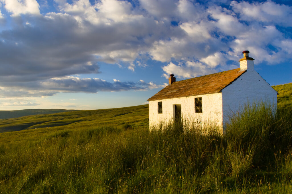 England, Cumbria, Hartside. A small cottage located within the barren landscape of Hartside Pass near Alston.