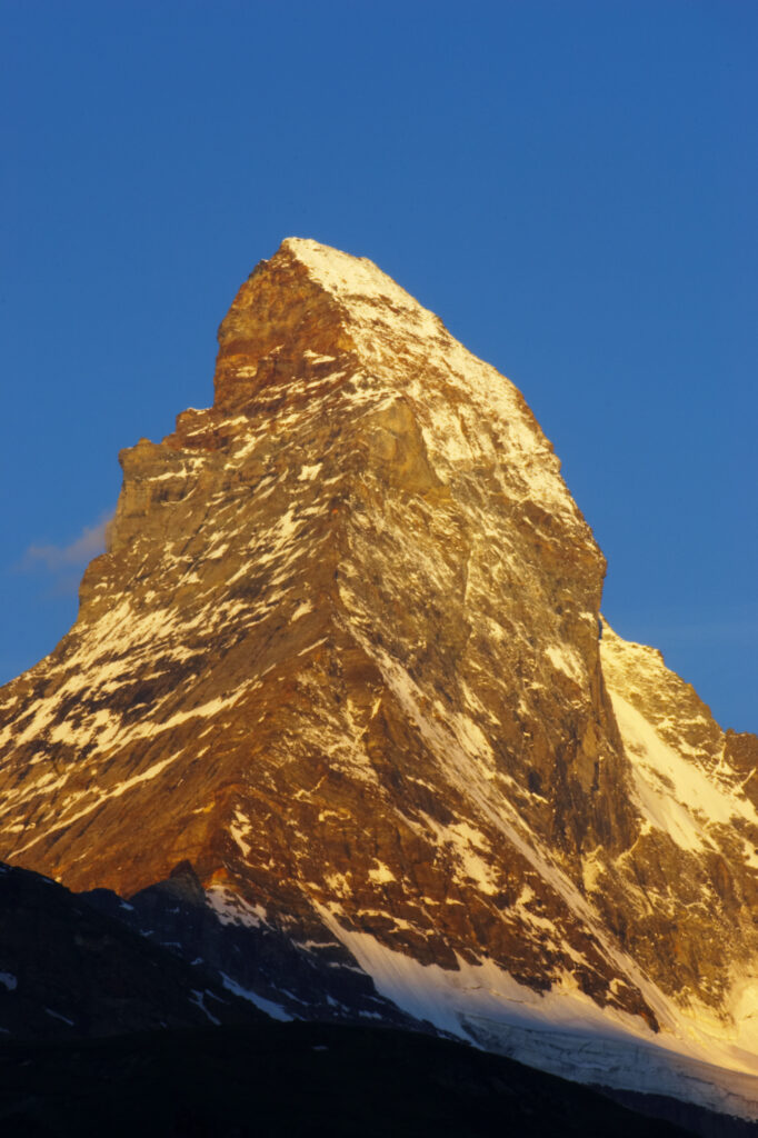 Switzerland Valais The Matterhorn Early morning light iluminates the impresive form of the Matterhorn mountain near Zermatt