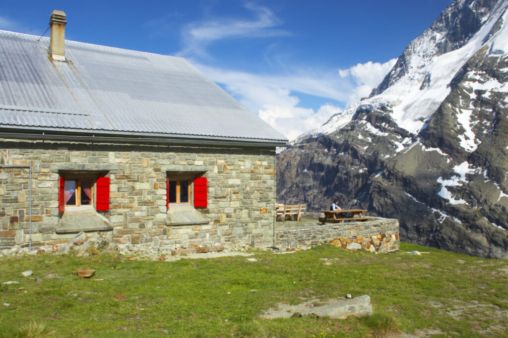 Switzerland Valais Schonbielhutte A popular swiss alpine hut in a landscape dominated by the form of the Matterhorn