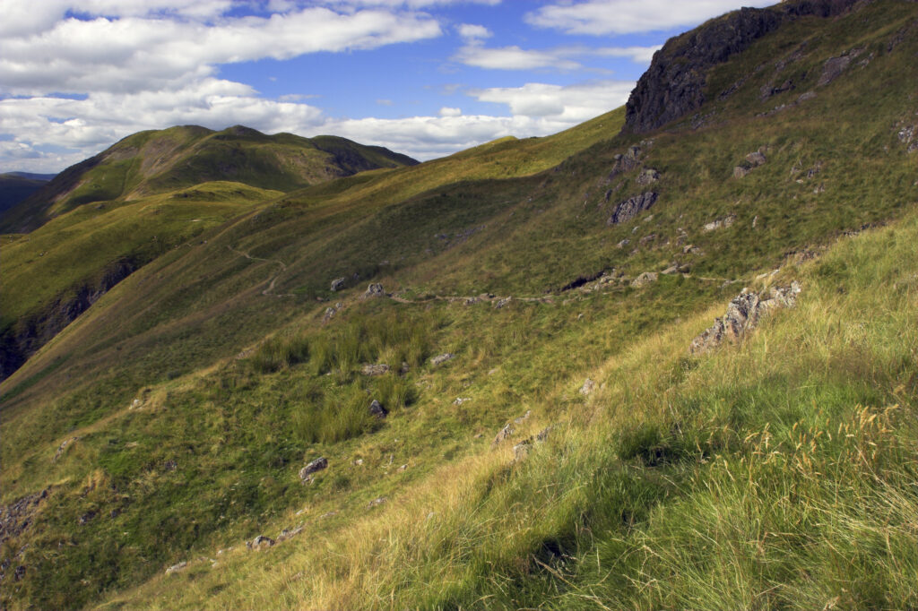 England, Cumbria, Lake District National Park. The summer colours of the hills and fells of Patterdale Common