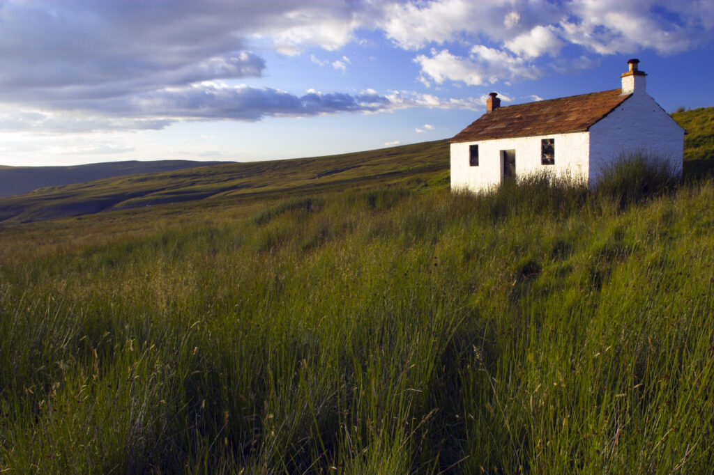 England, Cumbria, Hartside. A small cottage located within the barren landscape of Hartside Pass near Alston.