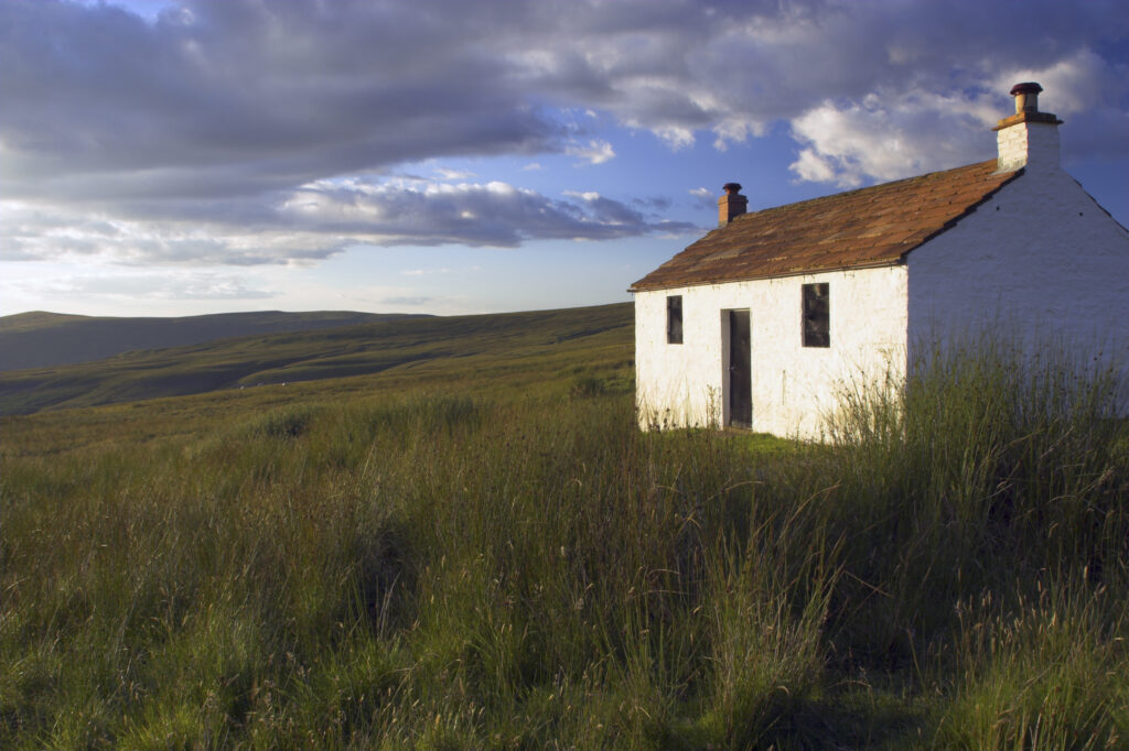 England, Cumbria, Hartside. A small cottage located within the barren landscape of Hartside Pass near Alston.